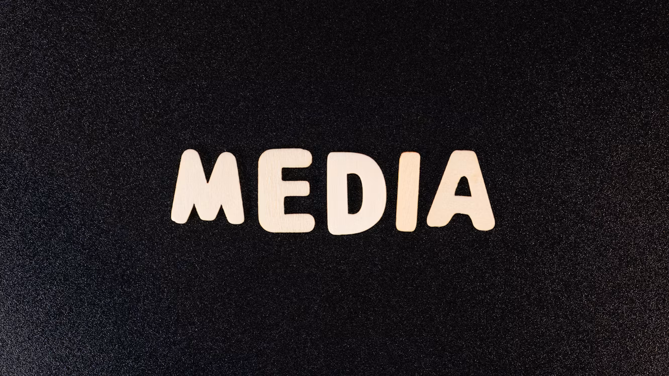 The word media spelled with white letters on a black background